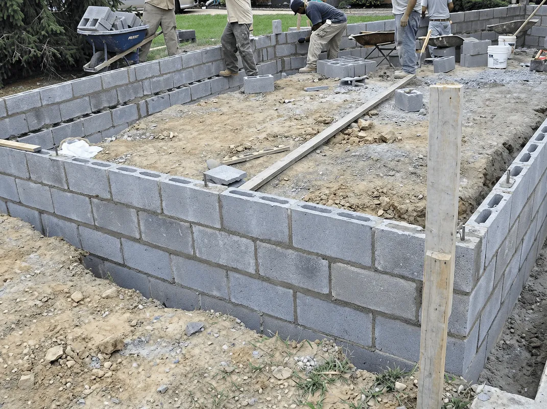 Professionals building a foundation with blocks in Miami, FL