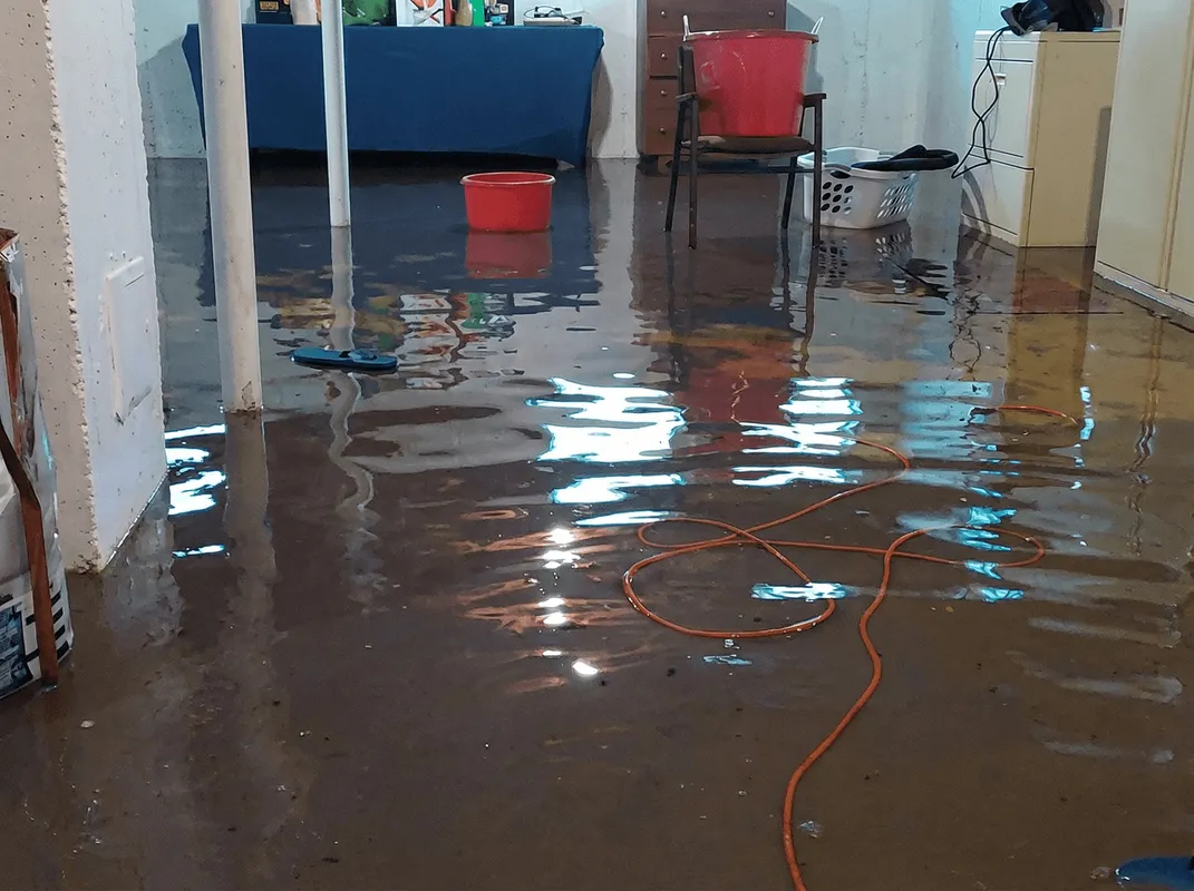 Basement with boiler, cabinets and washing machine completely flooded in Miami, FL